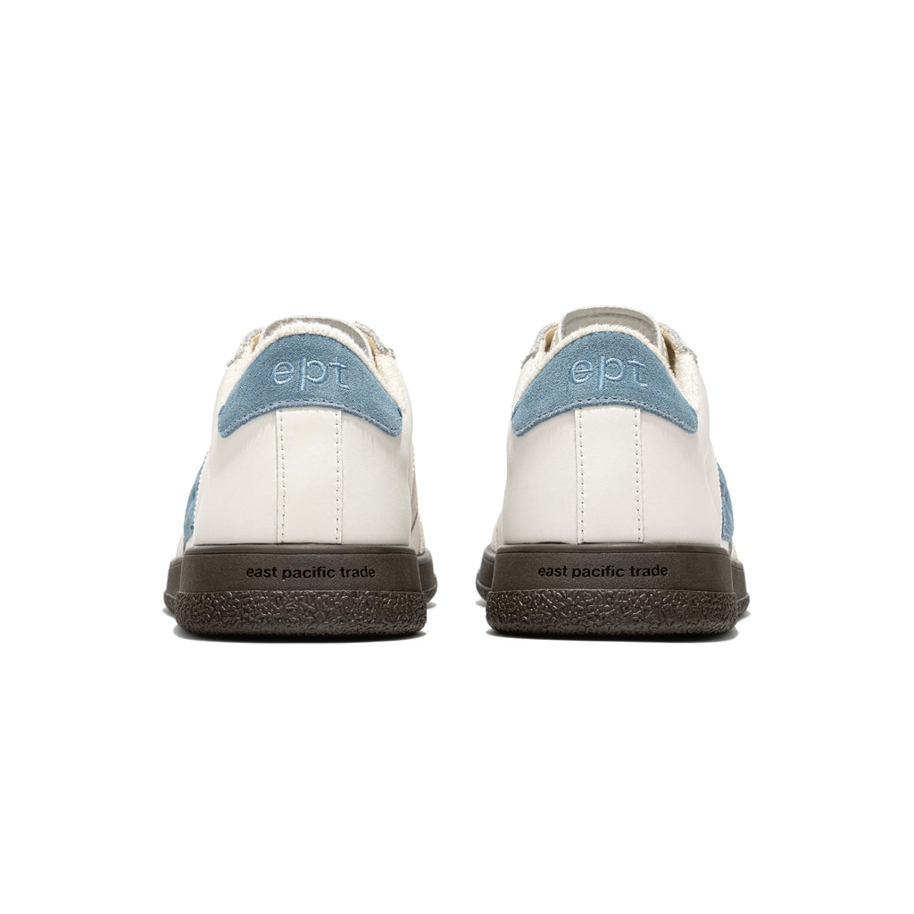 Low-profile vintage trainers with grey overlays and blue details
